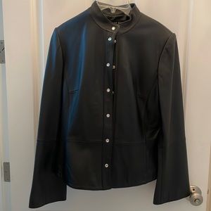 Anne Klein, black leather jacket with rhinestone buttons.